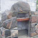 outdoor granite fieplace under construction