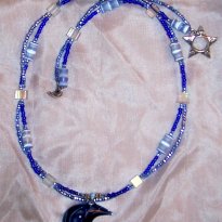 Examples of jewelry made by Punkin B4 Midnite with your pet's picture on it