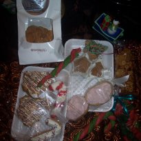 One picture of all the goodies that our fur-baby's got out of the goodie basket I won from K-9 Bakeries! I should note that the puppies have actually eaten some fo the goodies so it's not a complete picture of all the goodies within,lol :)