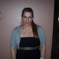 Another picture of me, wearing the outfit but with my hair up :)