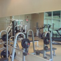 gym overlooking the pool area
