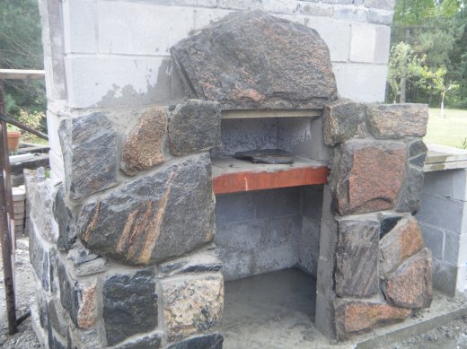 outdoor granite fieplace under construction